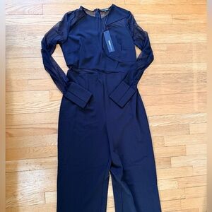 NWT Fashion Nova Black Jumpsuit with Mesh Sleeves and Cutouts Women’s Large